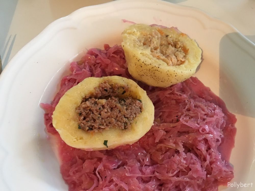 pink sauerkraut with savory dumpling, one half with meat the other with fish